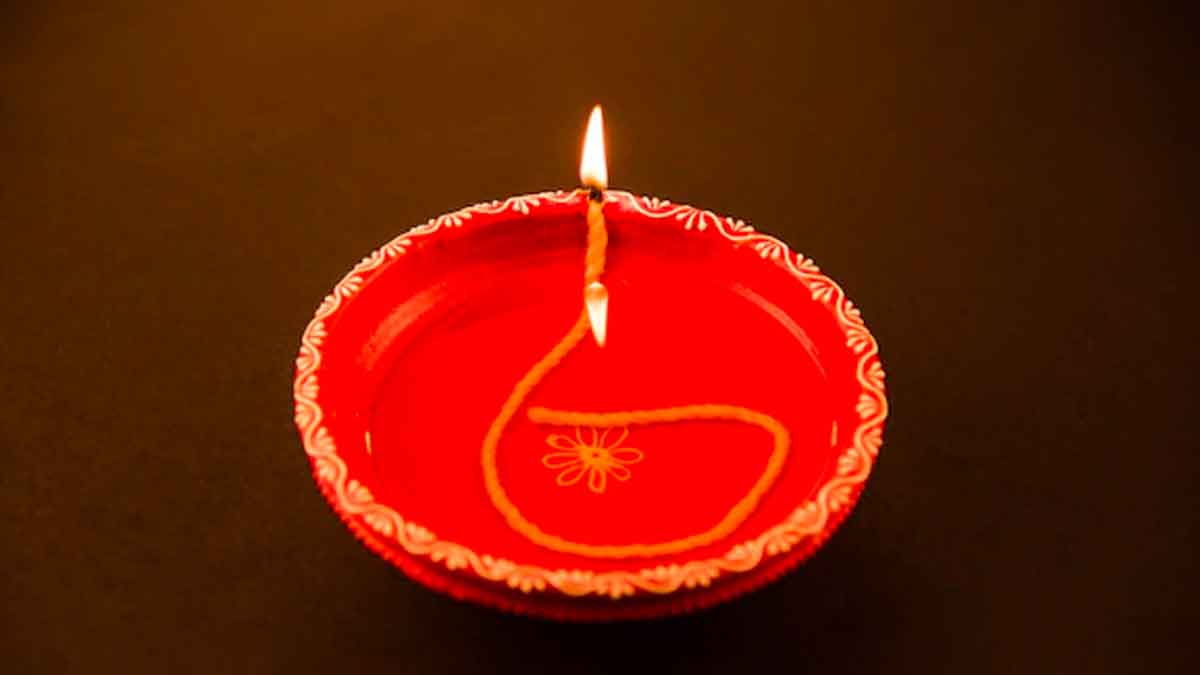 what is akhanda deepam and how it is lit 