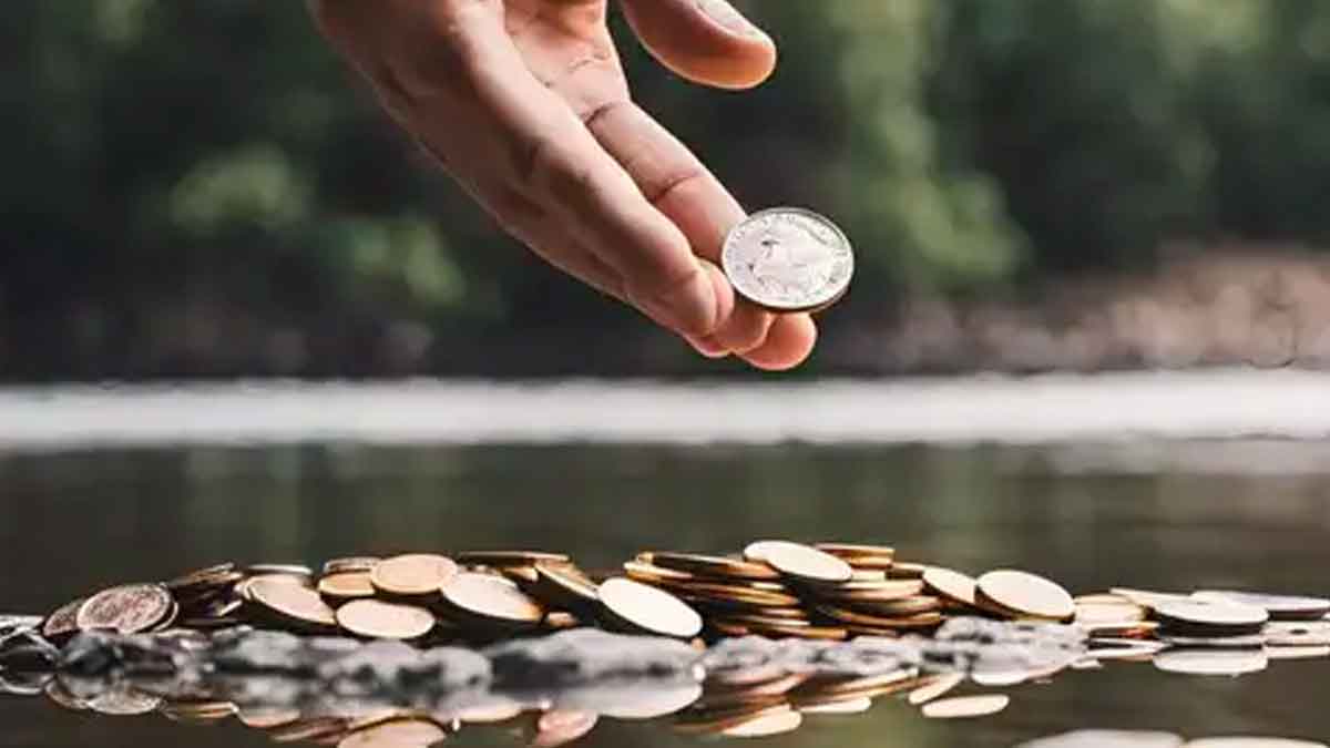 why people throw coins in river 