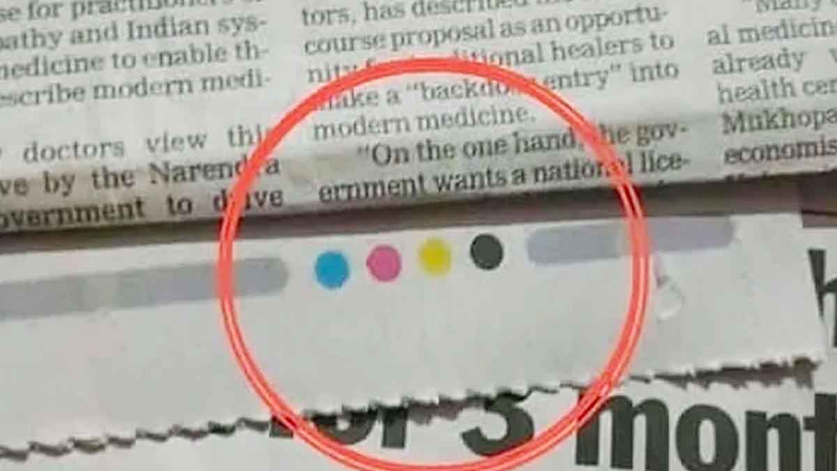 do you know what are these 4 dots printed on news papers 