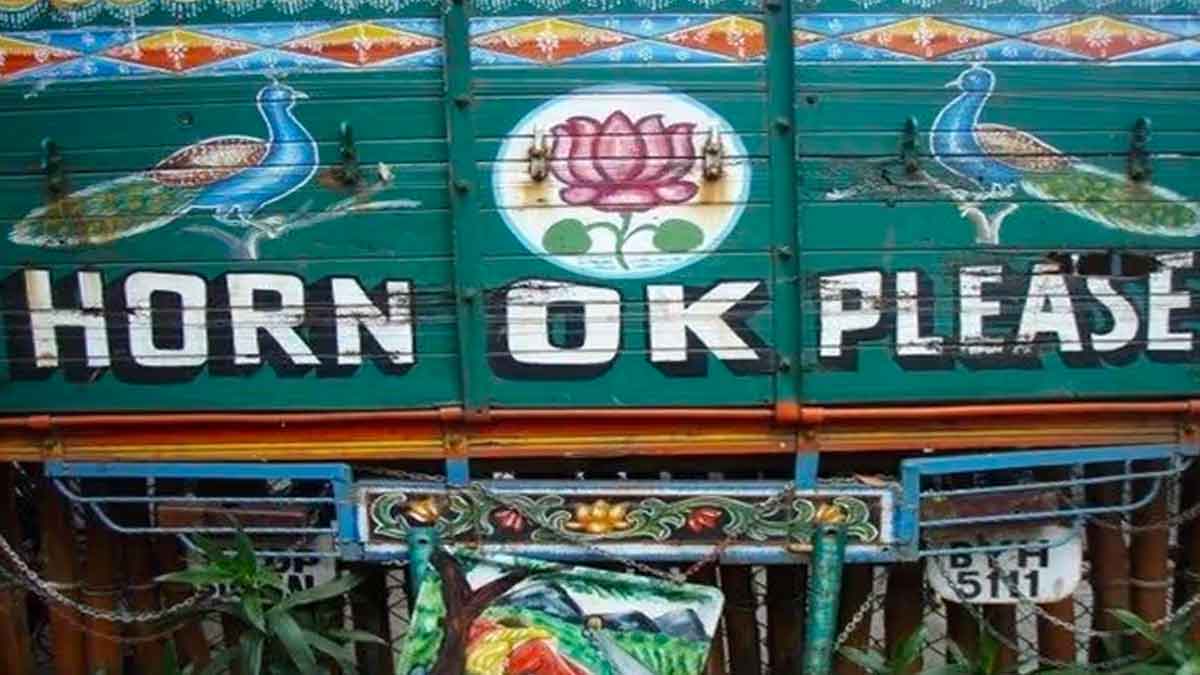 what is the meaning of horn ok please behind trucks 