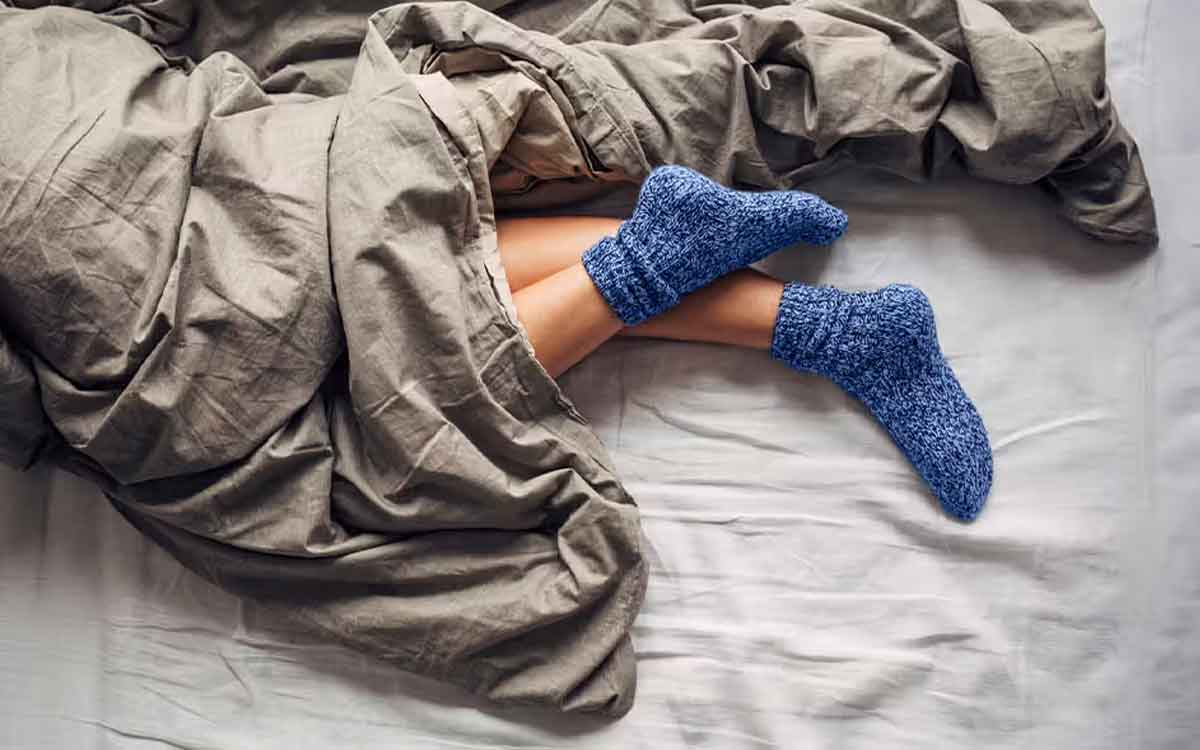 wear socks on bed for good night sleep 